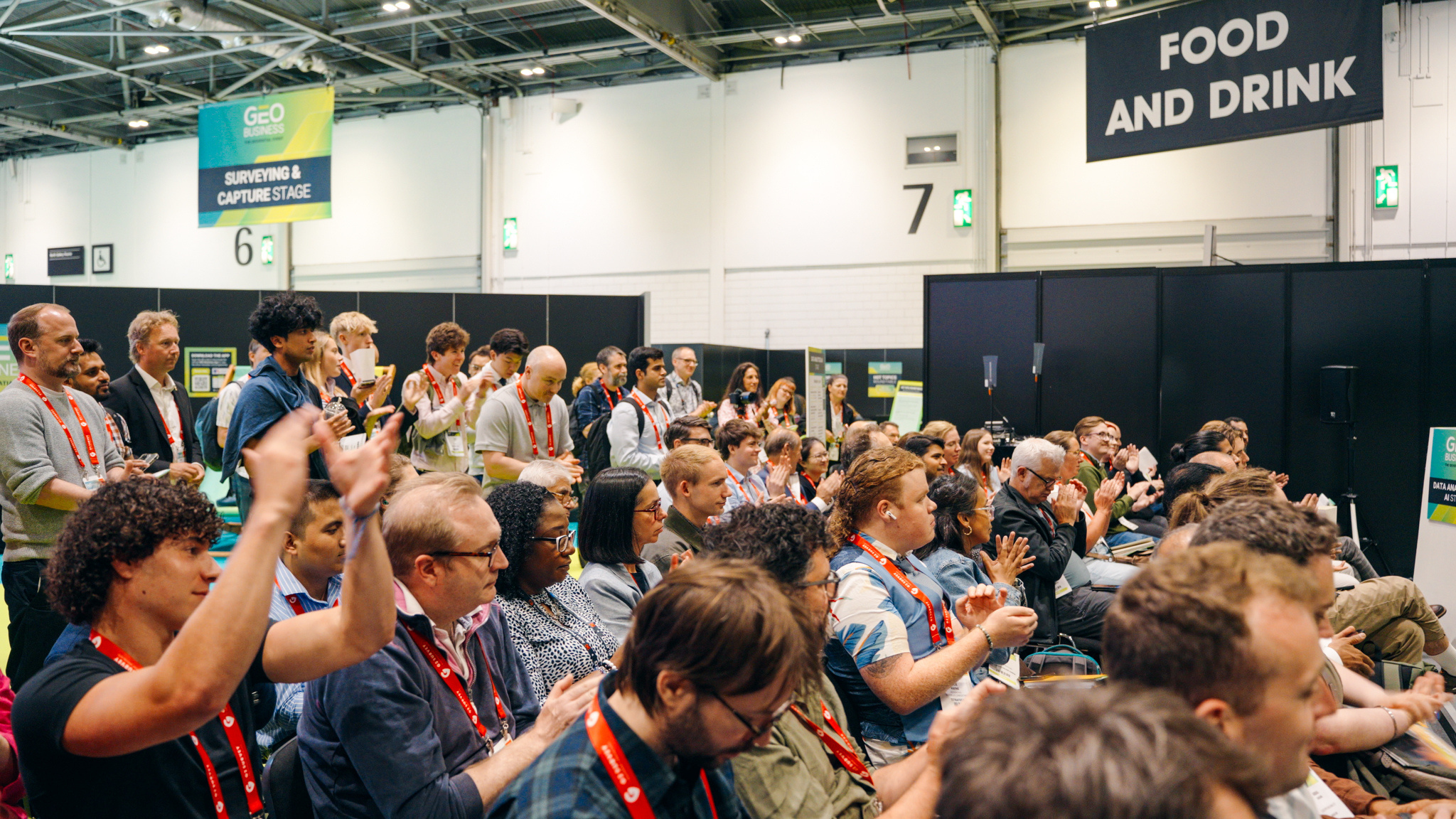 GEO Business audience applauding the talk